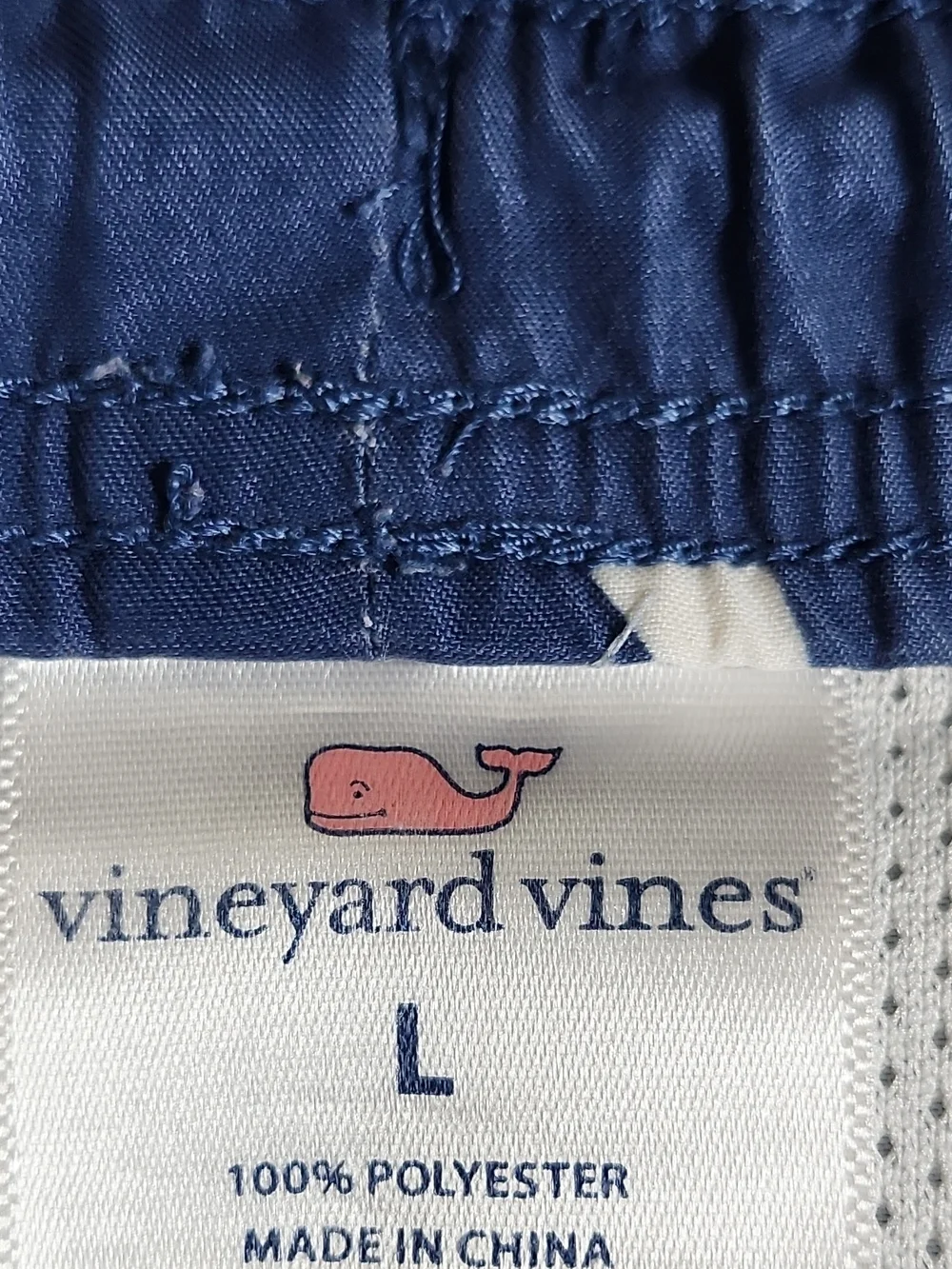 Vineyard Vines Navy Swim Trunks with Pink, Teal & Lime Plane Print